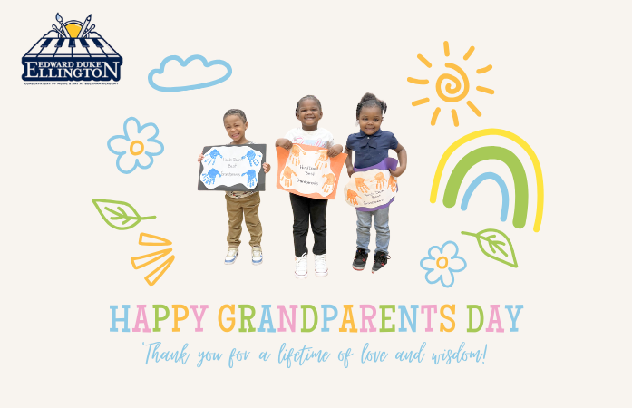  Three preschool students holding their art work that that created for grandparents day.